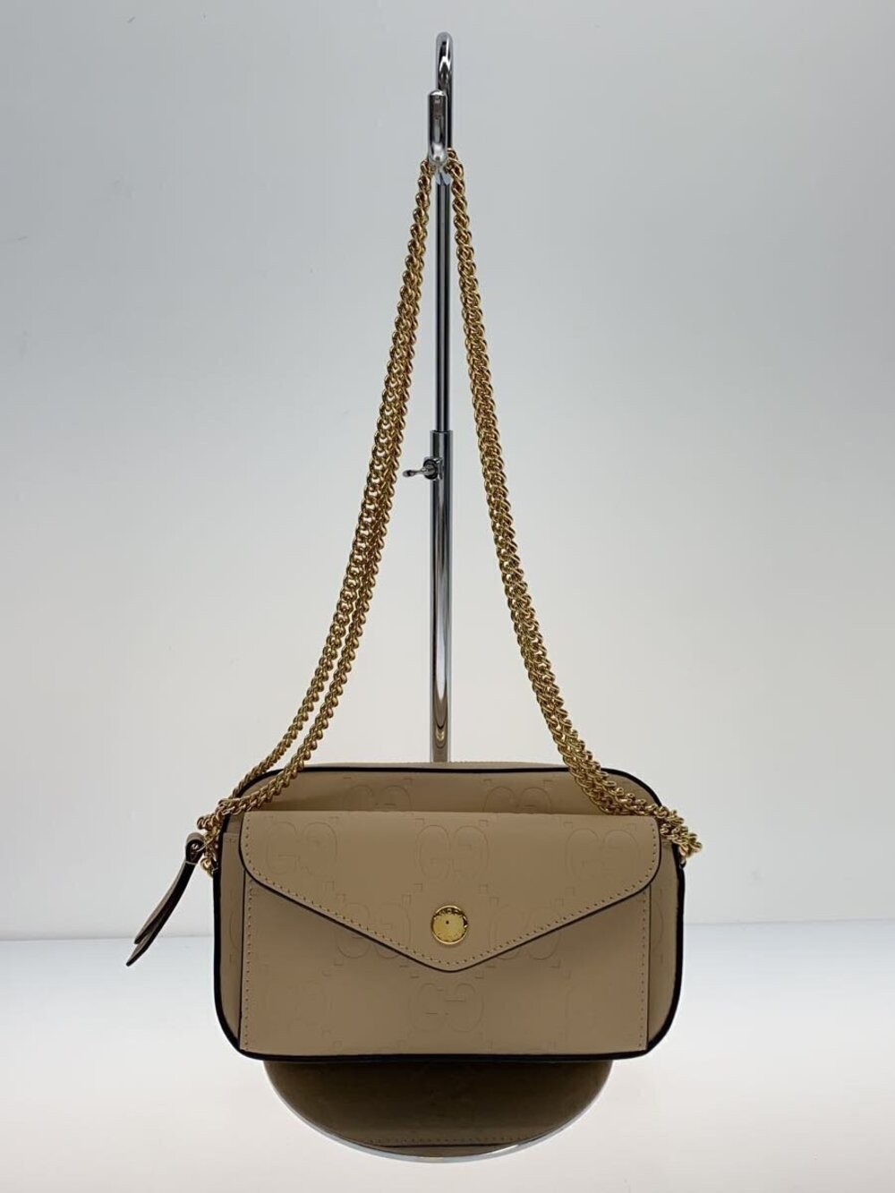 Gucci Beige GG Embossed Leather Super Crossbody Bag debossed cream